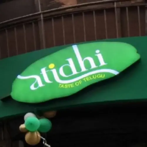 Atidhi - Satya Niketan logo